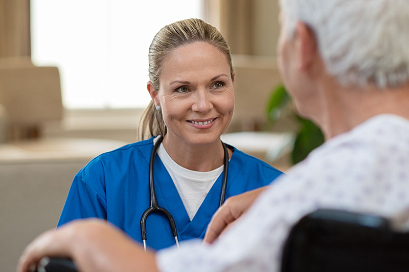 In home hospice care nurse with patient